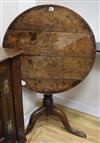 A George III oak tripod table W.73cm                                                                                                   