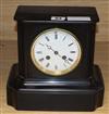 A black slate mantel clock                                                                                                             