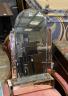 An Art Deco style peach and clear glass wall mirror, width 46cm, height 70cm                                                                                                                                                