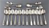 A set of eighteen George III silver fiddle pattern dessert spoons, Eley, Fearn & Chawner, 23.5 oz.                                     