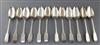 A set of twelve George V silver fiddle pattern table spoons, C.W Fletcher & Sons Ltd, 25 oz.                                           