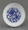 A Chinese blue and white 'dragon' dish, diameter 16.3cm, some damage                                                                   