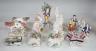 A pair of Hochst porcelain models of cows, 10.5cm long, a lidded box and other Continental figures                                                                                                                          