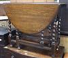 A 1920's oak gateleg table                                                                                                             