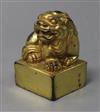 A Chinese gilt bronze lion-dog seal                                                                                                    