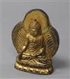 A Chinese gilt bronze figure of a Buddha                                                                                               