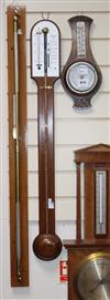 A mahogany cased wheel barometer, thermometer, together with a smaller aneroid barometer/thermometer Wheel barometer height 70cm       