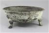 A Chinese archaic bronze tripod water basin, Pan, Warring States period, 4th/2nd century B.C., 39cm diameter, holes beneath rim        