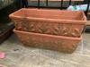 A pair of rectangular terracotta planters, width 52cm height 18cm                                                                                                                                                           