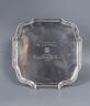 An Edwardian silver waiter, London, 1909, with later presentation inscription, 17.2cm, 8.5oz                                                                                                                                