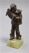 A bronze accordion player on onyx base                                                                                                 