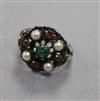 An Art and Crafts white metal and gem set ring, size Q.                                                                                