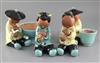 Gudrun Baudisch (1907-1982). A set of four Wiener Werkstatte tin glazed terracotta figures of China men, 21.5- 22cm high               