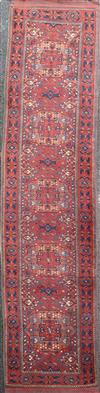 An Ersari red ground runner, 13ft by 3ft 6in.                                                                                          