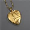 A Chinese gold locket (stamped 22K) on 18ct gold fine suspension chain.                                                                