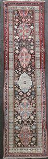 A Persian ivory ground runner, 13ft 2in by 4ft 4in.                                                                                    