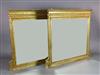 A pair of Edwardian giltwood and gesso overmantel mirrors, W.4ft 5in. H.4ft 2in.                                                       