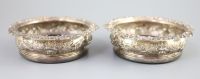 A pair of George IV silver wine coasters, S.C. Younge & Co, Sheffield, 1824, 16.7cm,                                                   