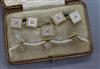 An early-mid 20th century cased six piece 18ct gold and mother of pearl dress stud set.                                                