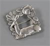 A Danish Georg Jensen sterling silver square recumbent deer brooch, no. 318, 38mm.                                                     