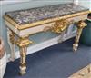 A parcel gilt marble top console table W.138cm                                                                                         