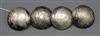 Four white metal buttons                                                                                                               