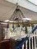 A brass five-light chandelier with etched glass pendant shades                                                                                                                                                              