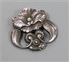 An early 20th century Danish Georg Jensen sterling silver stylised flowerhead brooch, no. 97,                                          