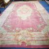 A Donegal Savonierie pattern pink ground carpet 615 x 345cm                                                                            