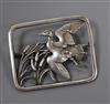 A Georg Jensen sterling 'duck in flight amongst reeds' rectangular brooch, no. 300, 48mm.                                              