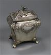 An early Victorian embossed silver bombe shaped tea caddy, Edward Barton, London, 1838, 11 oz.                                         