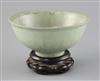 A Chinese Longquan celadon bowl, Ming dynasty, D. 18.5cm, crackle to glaze, wood stand                                                 