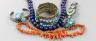 A lapis lazuli necklace, 48cm, a coral necklace and a group of turquoise set jewellery, including a gilt white metal two row hinged bangle and an antique pendant?.                                                         