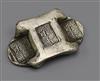 A Chinese white metal ingot                                                                                                            