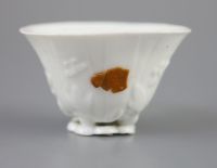 A Chinese Dehua blanc de chine libation cup, 5.3cm high                                                                                