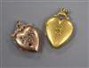 Two yellow metal and gem set heart shaped pendant lockets, one 9ct, 32mm.                                                              