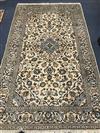 A Kashan cream ground carpet 260 x 150cm                                                                                               