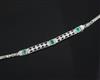 A 1920's 18ct white gold and platinum, emerald and diamond bracelet, in a fitted Asprey, London box.                                   