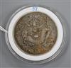 A Chinese silver coin                                                                                                                  