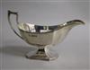 A George V silver sauceboat with octagonal foot, 5.5 oz.                                                                               