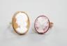 Two 9ct and oval cameo shell set rings, each carved with the bust of a lady to dexter, gross 5.9 grams.                                                                                                                     