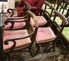 A set of four Regency mahogany dining chairs (two arm, two single)                                                                     