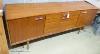 A mid century design teak sideboard, length 183cm, depth 46cm, height 76cm                                                                                                                                                  