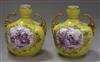 A pair of Dresden, in the Meissen style, yellow and mauve vases                                                                        