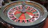 A roulette wheel by "John Huxley" Grosvenor casino diameter 80cm approx.                                                               