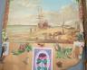 A Victorian scrapbook, mounted with coloured cards, cut outs and scraps, 43 cms high.                                                                                                                                       