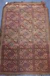 An Afghan red ground geometric patterned rug 145 x 102cm                                                                               