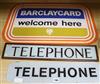 An enamel Barclaycard double sided sign and two glass telephone signs Barclaycard sign 50 x 76cm                                       