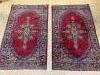 A pair of North West Persian burgundy ground rugs, 160 x 98cm                                                                                                                                                               