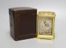 A cased late 19th century French gilt brass carriage timepiece with pastoral scene enamelled dial - 13cm talk                                                                                                               